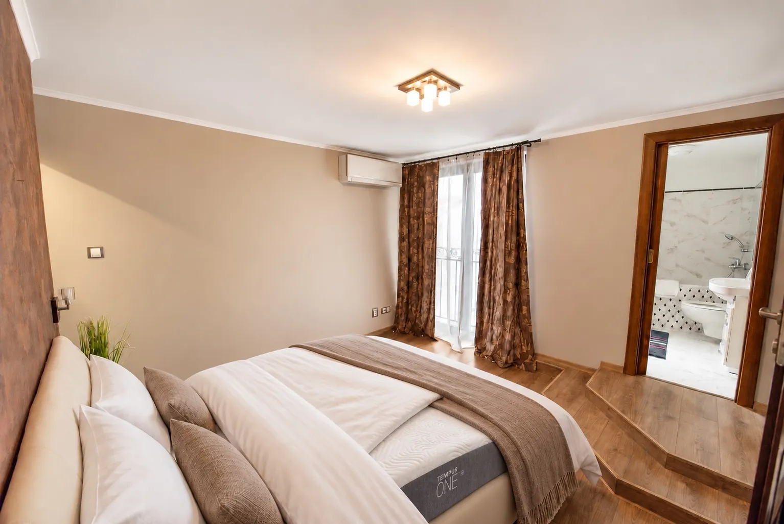 King bed with a Tempur mattress in the master bedroom